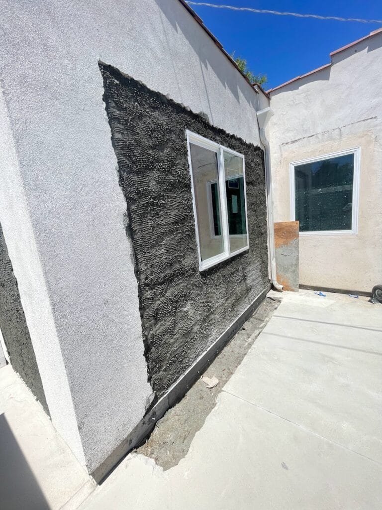 ADU Addition garage conversion window installation, foundation work, electrical, construction of walls etc. in Los Angeles
