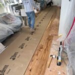 General Contractor Construction Company Los Angeles - Kitchen, bathroom, laundry room remodel with seamless wood flooring installation in the living room and first floor of the house in Baldwin Hills View Park