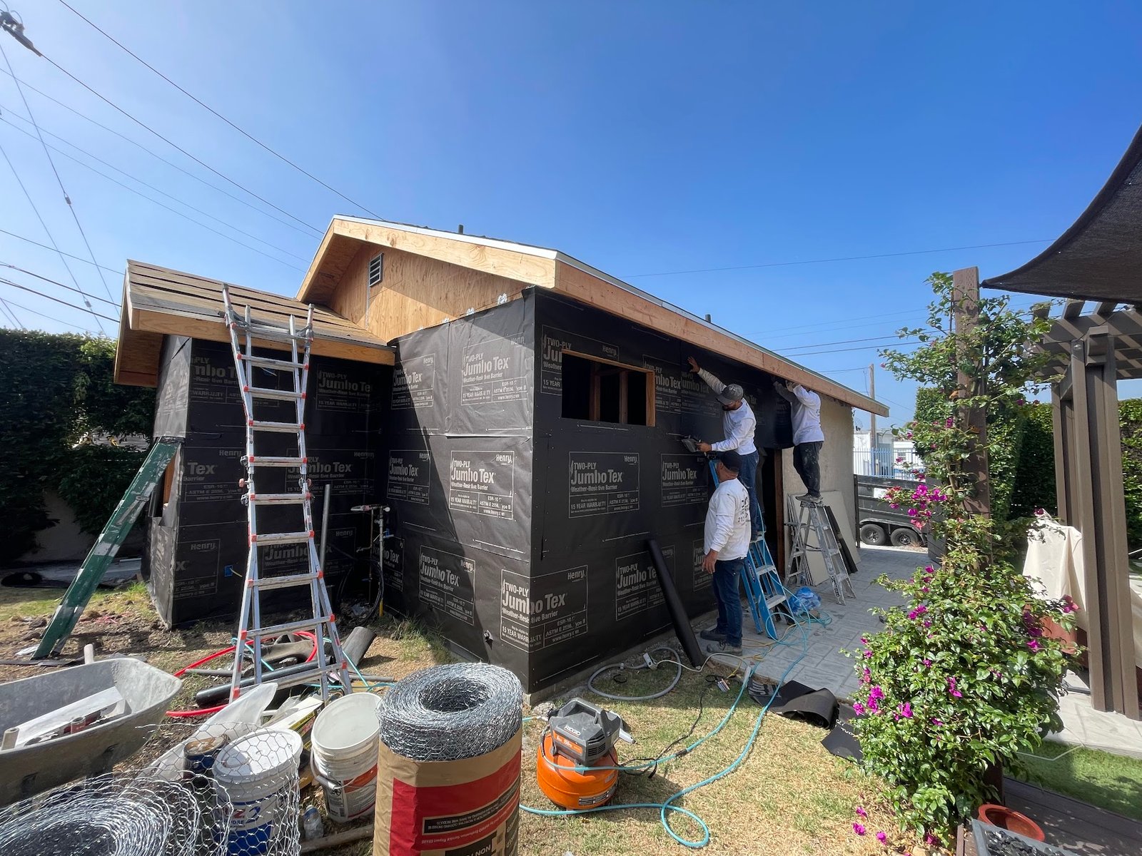 Weather barrier installation on an ADU and home addition in Los Angeles.