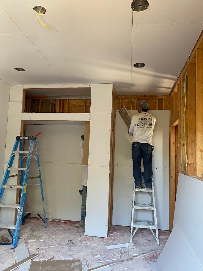 Closet framing and drywall in a Los Angeles home addition.