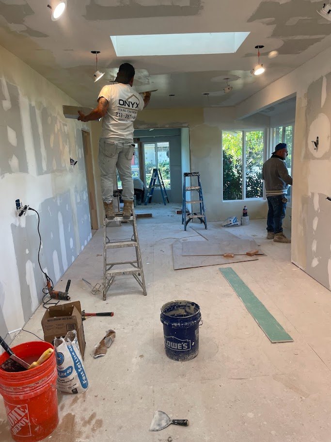 Drywall installation underway on a Los Angeles project.