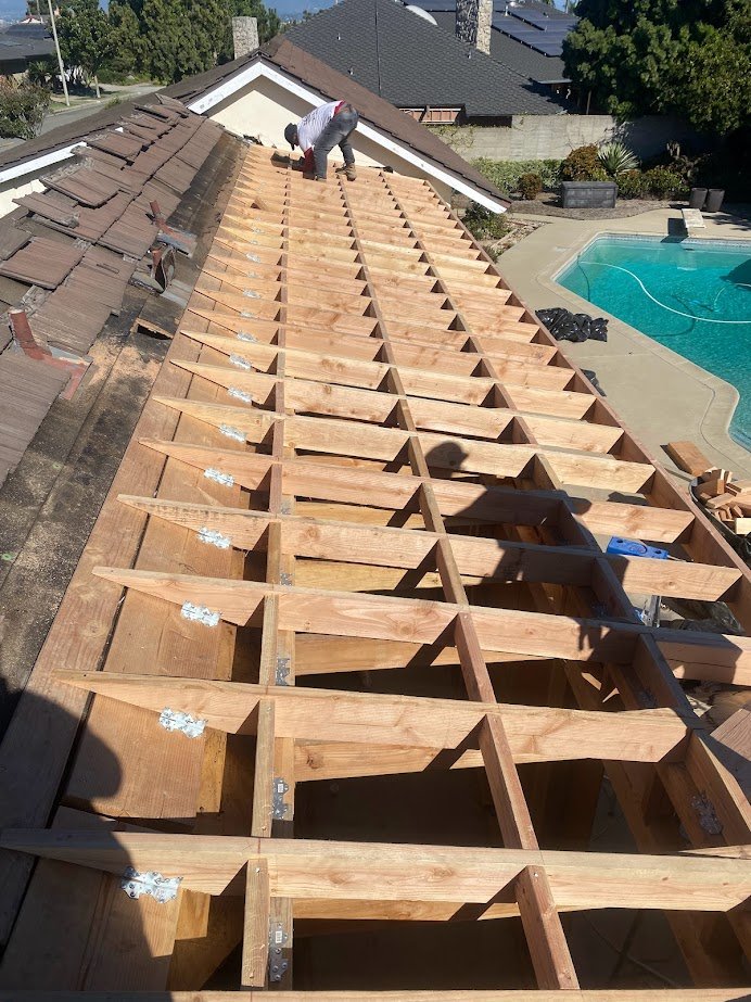 Roof framing and rafter installation for a Los Angeles room addition.