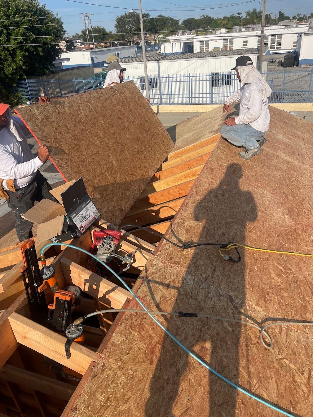 Roof sheathing installation for a Los Angeles room addition.