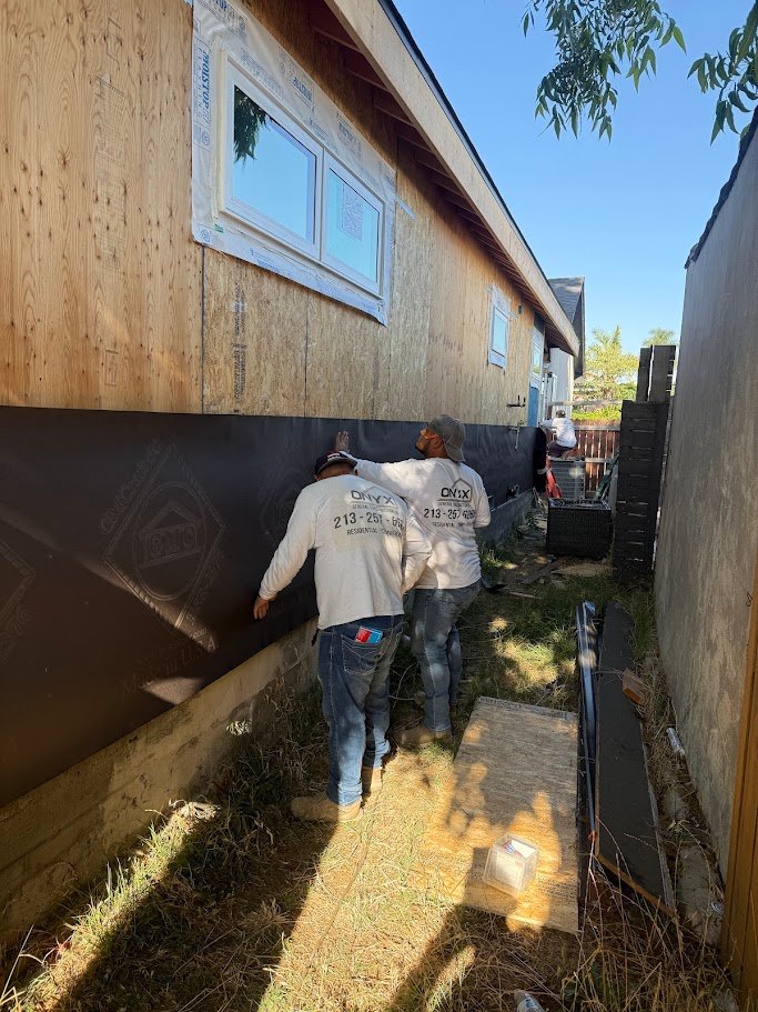 Exterior sheathing waterproofing on a Los Angeles room addition.