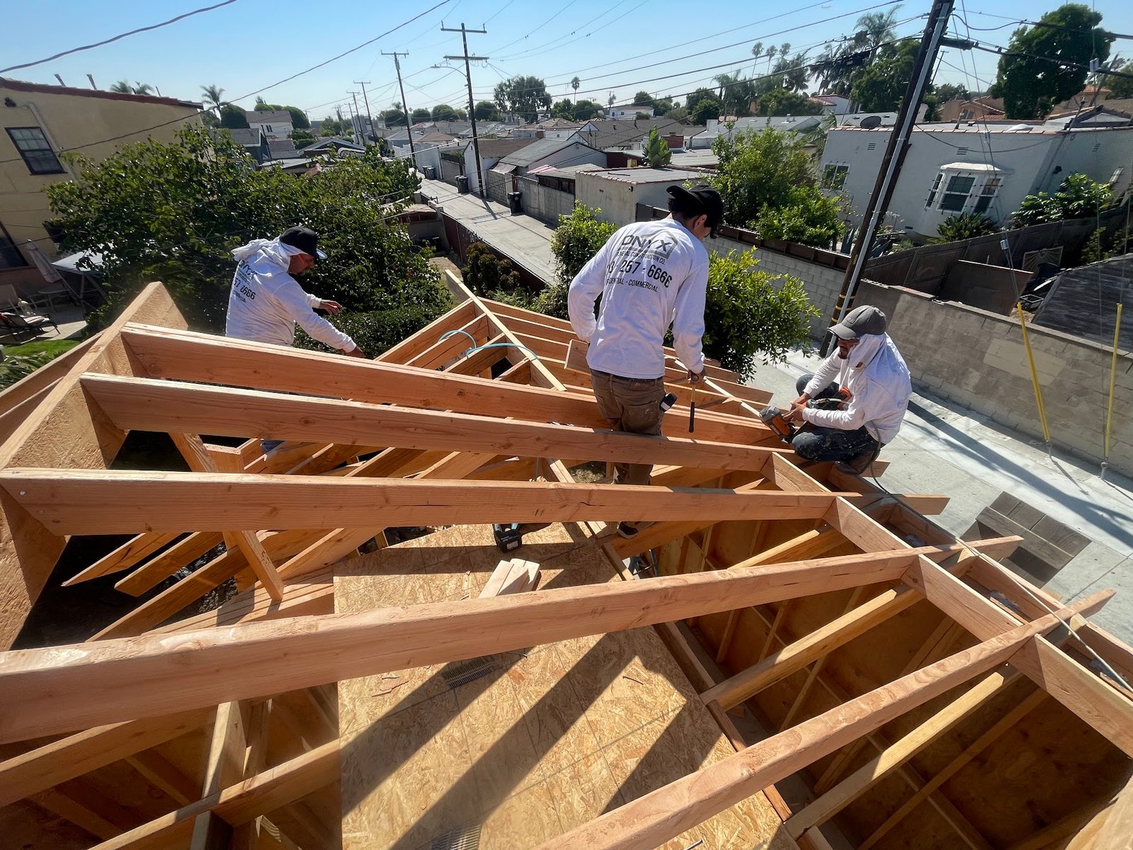 Roof truss structure installation for a Los Angeles home addition.