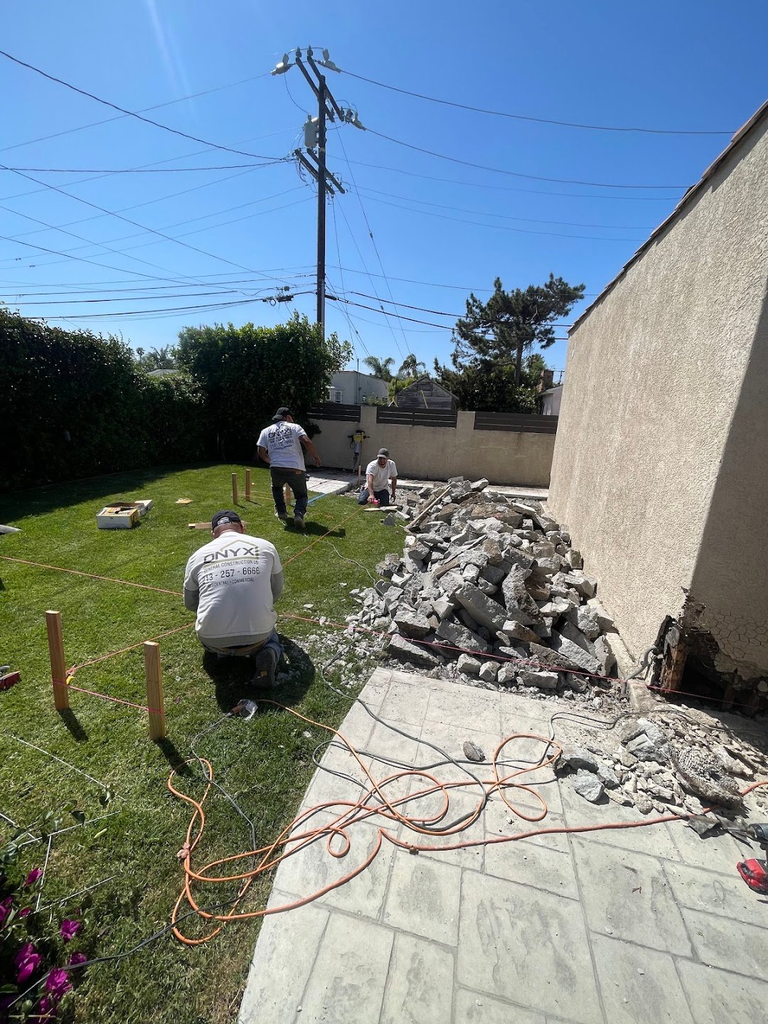 Backyard demolition and footing preparation at a Los Angeles home.