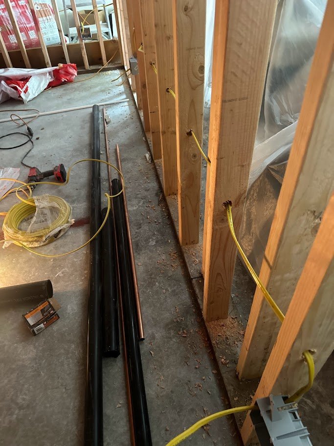 Rough plumbing and rough electrical installed together in Los Angeles.